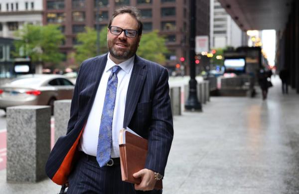 Attorney Beau Brindley walks along Dearborn Street after exiting the Dirksen U.S. Courthouse in downtown Chicago, Oct. 19, 2023.  Brindley is representing Terry Ferguson of Willowbrook. 