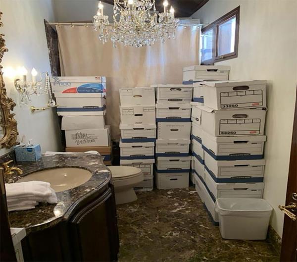 In this handout photo provided by the US Department of Justice, stacks of boxes can be observed in a bathroom and shower in The Mar-a-Lago Club's Lake Room at former US President Do<em></em>nald Trump's Mar-a-Lago estate in Palm Beach, Florida