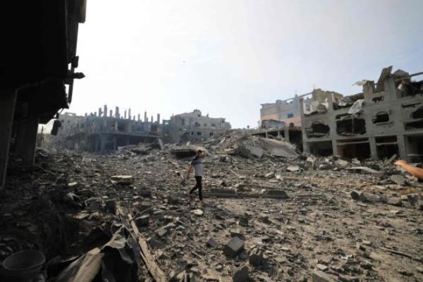 GAZA CITY, GAZA - OCTOBER 11: A view of destroyed buildings and debris at the Jabalia neighborhood after an Israeli airstrike that has been going on for five days in Gaza City, Gaza on October 11, 2023. (Photo by Mustafa Hassona/Anadolu via Getty Images)