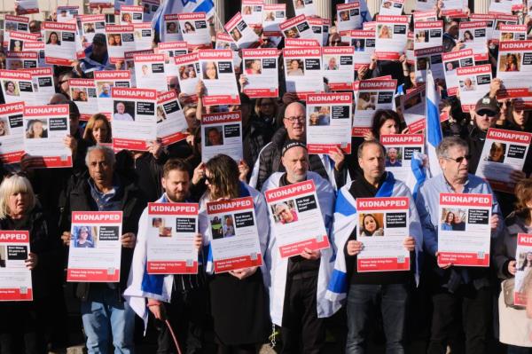 Relatives holding Kidnapped Israeli posters. 