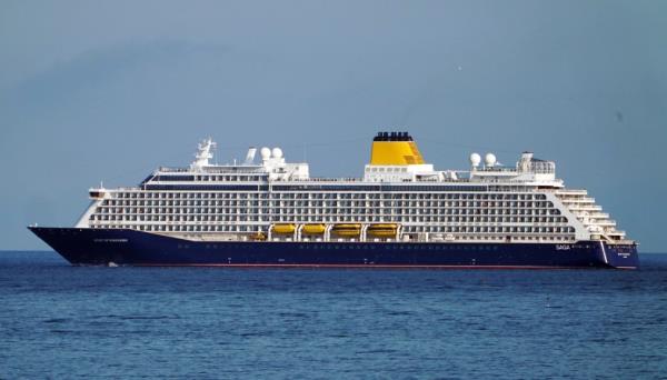 Around 100 people were injured Saturday when a cruise ship off the coast of the United Kingdom entered rough seas.