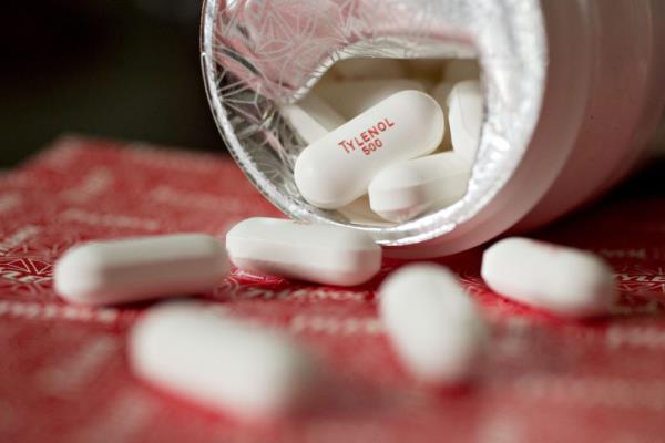 A bottle of Johnson & Johnson Tylenol brand pain reliever is arranged for a photograph in Tiskilwa, Illinois, U.S., on Thursday, April 14, 2016.