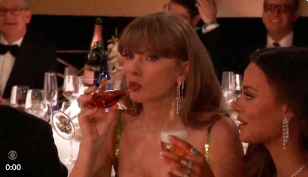 Taylor Swift glares at Koy after his Golden Globes joke a<em></em>bout her.