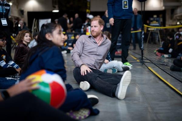 Prince Harry, Duke of Sussex, playing sitting volleyball with elementary school students at the Invictus Games 2025 School Program Launch Event in Vancouver, Canada