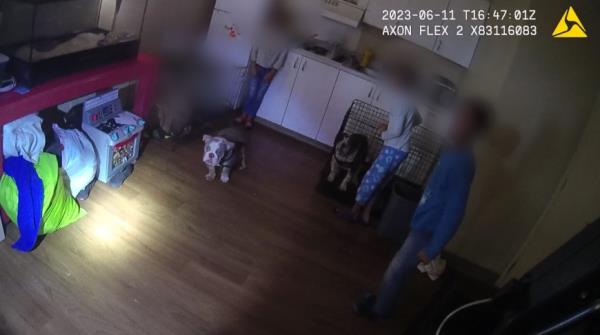 Video grabs from police body cam footage shown by KLAS shows Las Vegas Metro police rescuing six children a one-bedroom, one-bathroom extended-stay apartment near Flamingo Road and Valley View Boulevard. 