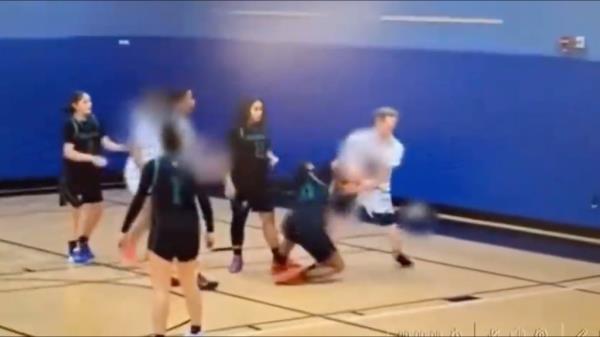 KIPP Academy's player who reportedly identifies as a female fights with an oppo<em></em>nent from Collegiate Charter for possession of the ball.