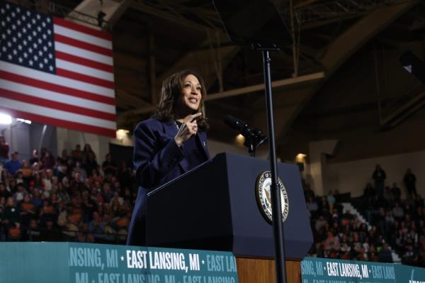 Vice President Kamala Harris speaks at a campaign rally at Jenison Field House on the campus of Michigan State University. 