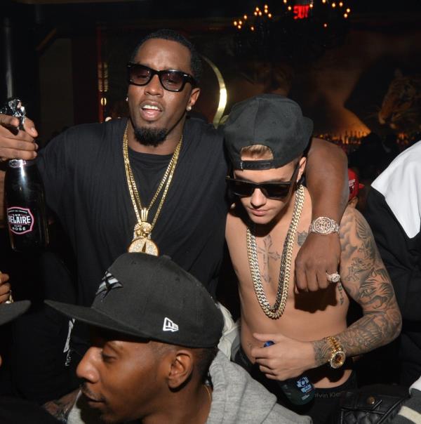  Sean 'Diddy' Combs and Justin Bieber attend Ciroc party at Vanquish Lounge on February 5, 2014 in Atlanta, Georgia.