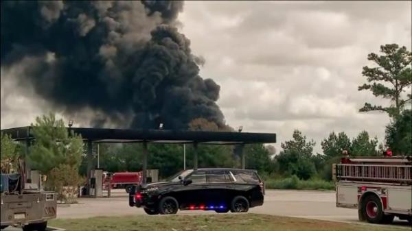 Smoke fills the sky from a chemical plant fire in Shepherd, Texas on Thursday morning