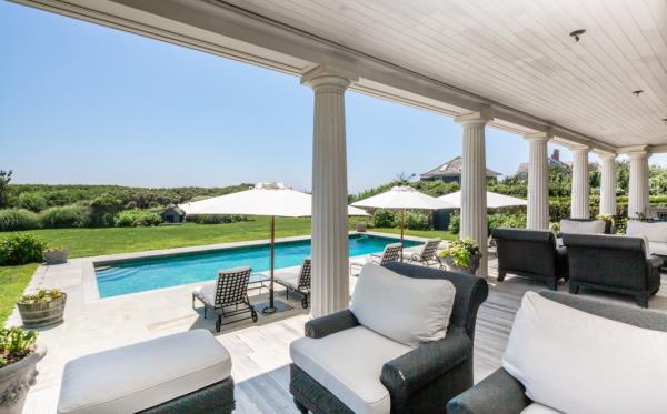 Entertaining on the porch, overlooking the pool, is a breeze