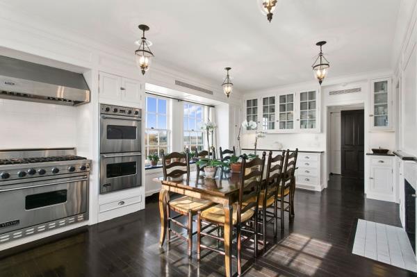 A large chef's kitchen is a gathering spot