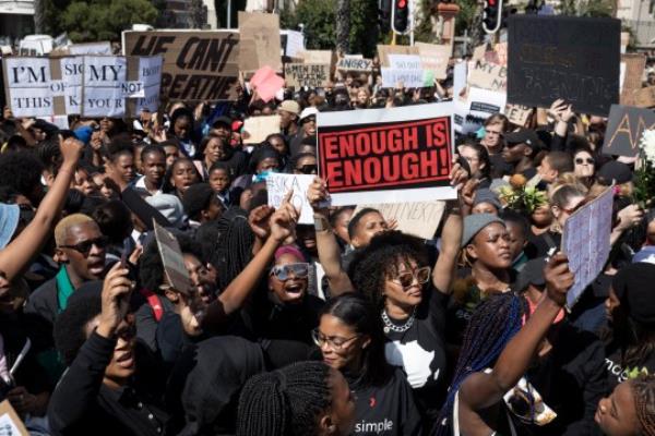 Tens of thousands protest outside parliament against gender ba<em></em>sed violence following a week of brutal murders of young South African women in Cape Town, South Africa, 05 September 2019. 