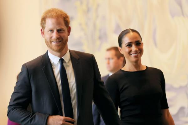 Prince Harry, Duke of Sussex, and Meghan, Duchess of Sussex, smiling as they arrive at the United Nations Headquarters in New York City on July 18, 2022