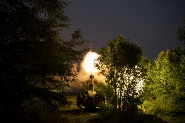 Ukraine Special Operations Forces fire a 122mm howitzer D-30 towards Russian positions in Kherson region, Ukraine, Tuesday, June 13, 2023