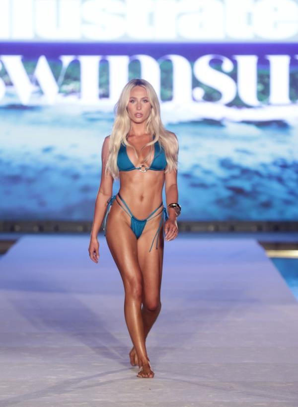 Alix Earle walking on the runway during Miami Swim Week