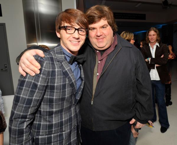 Two men, Drake Bell and Dan Schneider, posing for a picture at an after party for 