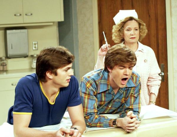 Ashton Kutcher, Topher Grace and Debra Jo Rupp in 