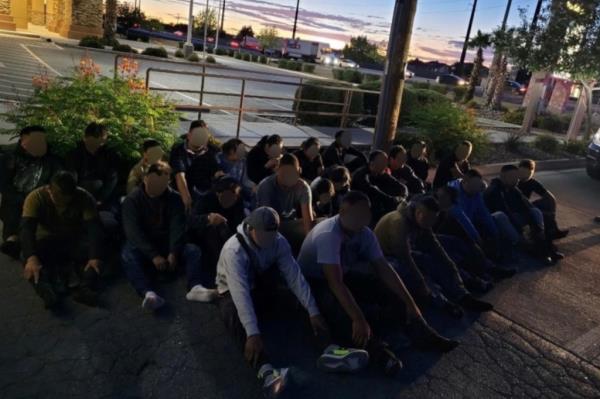 Four smugglers and 26 migrants were caught sneaking through El Paso on Friday using 