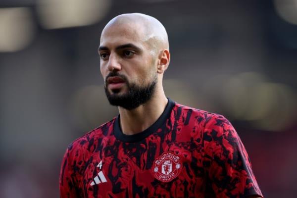 MANCHESTER, ENGLAND - OCTOBER 07: Sofyan Amrabat of Manchester United warms up prior to the Premier League match between Manchester United and Brentford FC at Old Trafford on October 07, 2023 in Manchester, England. (Photo by Alex Livesey/Getty Images)