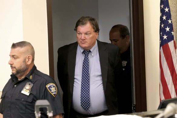 Rex Heuermann, enters the courtroom for a hearing at Suffolk County Court in Riverhead, New York.