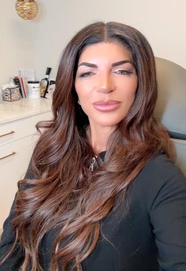 Teresa Giudice sitting in a chair, announcing she is dissolving her lip filler after receiving backlash over her appearance