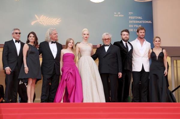 CANNES, FRANCE - MAY 15: (L-R) Michael DeLuca, Pamela Abdy, Doug Mitchell, Alyla Browne, Anya Taylor-Joy, George Miller, Tom Burke, Chris Hemsworth and Elsa Pataky attend the 