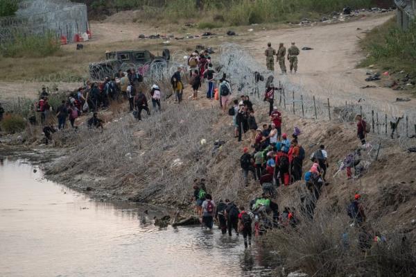 Fernando Valencia and Oswaldo Rivera (right) caught a cargo train as close to the US-Mexico border as they could before being forced off by Mexican officials, as they made their way to America.