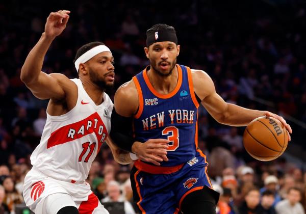 Josh Hart, who had 10 points and nine rebounds, drives on Bruce Brown during the Knicks' 126-100 win over the Raptors.