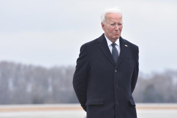 US President Joe Biden participates in dignified transfer of 3 fallen servicemen killed in Jordan drone attack in Dover Air Force ba<em></em>se.