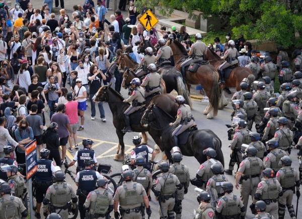 State troopers try to break up a pro-Palestinian protest at the University of Texas Wednesday April 24, 2024, in Austin, Texas.