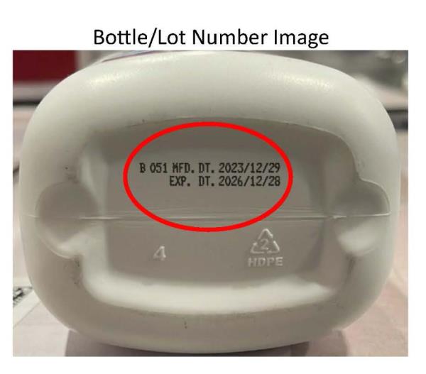 Bottom of Dynacare baby powder bottle showing batch number.