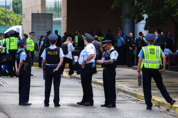 Police officers gather outside the United Center ahead of the Democratic Natio<em></em>nal Convention.