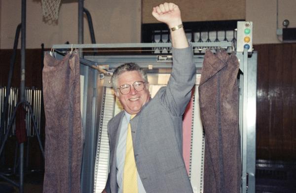 New York mayoral candidate Richard Ravitch gives hopeful clenched fist after casting his ballot in the city's primary election, Sept. 12, 1989