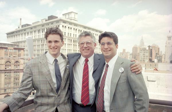 Richard Ravitch, center, former chairman of the Metropolitan Transit Authority, is joined by his two sons at a news conference, May 3, 1989 in New York.