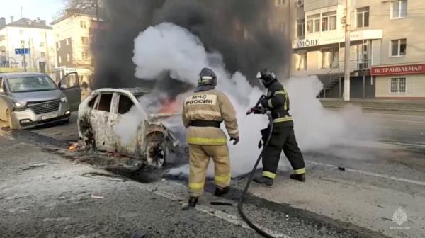 firefighters in Russia putting out car blaze