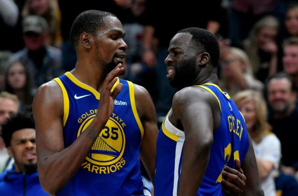 Kevin Durant (l) and Draymond Green (r) during their Warriors days.