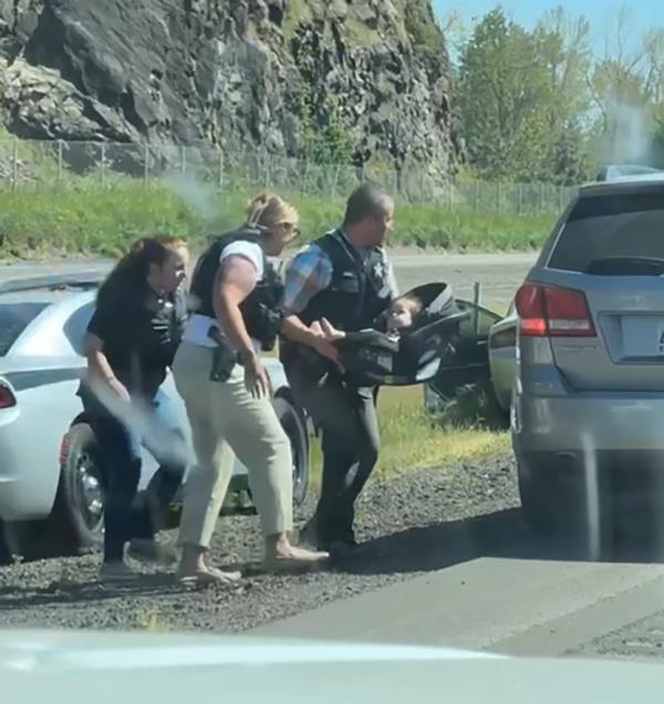 A group of people holding a gun