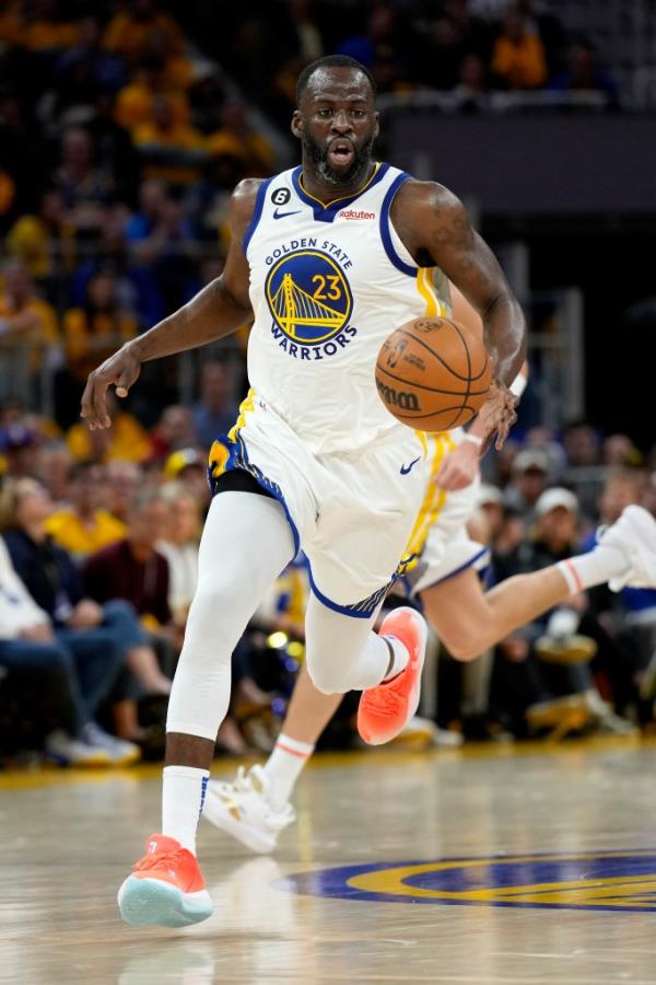 Draymond Green #23 of the Golden State Warriors brings the ball up court during the third quarter against the Los Angeles Lakers in game five of the Western Co<em></em>nference Semifinal Playoffs at Chase Center on May 10, 2023 in San Francisco, California.