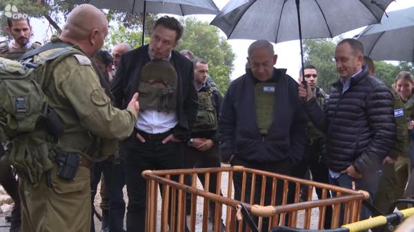 Elon Musk and Israeli Prime Minister Benjamin Netanyahu do<em></em>nned body armor as they toured a kibbutz ravaged by Hamas terrorists on Oct. 7. This kibbutz had a number of bullet casings inside, and was the home of released-hostage Abigail Edan, the four-year-old American dual citizen.