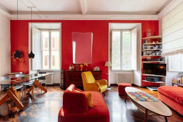 red accent wall and furniture