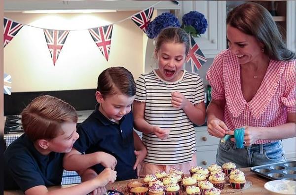 Prince George, Prince Louis and Princess Charlotte decorating cupcakes with their mother, Kate Middleton, for a Platinum Jubilee street party