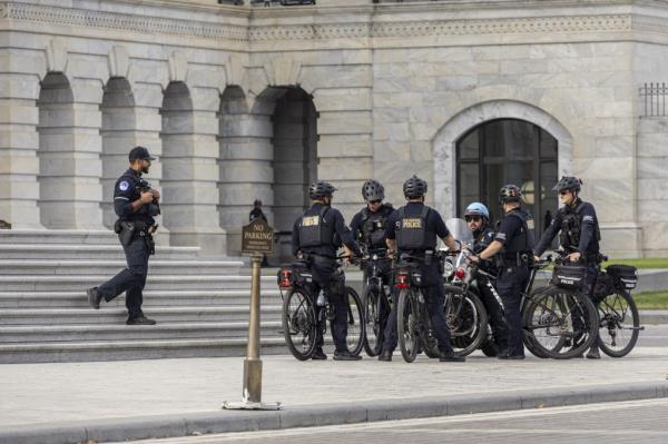 Police officers standing in front of the US Capitol in Washington DC, United States, on November 4, 2024, ahead of the US Presidential Election