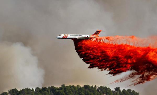 A Large Airtanker drops retardant on the Bucktail Fire on Aug. 1, 2024.