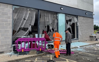 Damage at the Holiday Inn Express in Rotherham, South Yorkshire, wher<em></em>e anti-immigration rioters smashed the windows before starting fires on Sunday