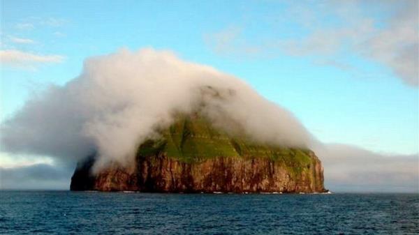 Litla Dimun is an uninhabited island, although legends say otherwise. It has its own cloud and looks like something from a fairy tale.