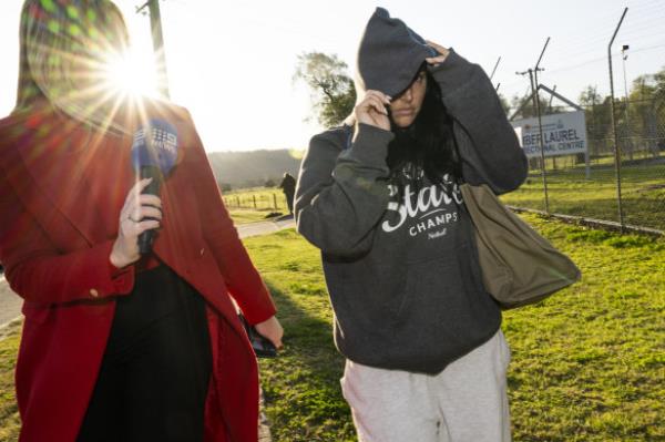 Brailey tried to cover her face when leaving the correctio<em></em>nal facility.