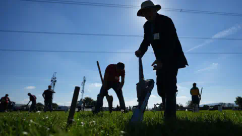 PA Thomas Cunningham from Galway takes part in the Loy digging competition at the Natio<em></em>nal Ploughing Championships. Sun backlit 