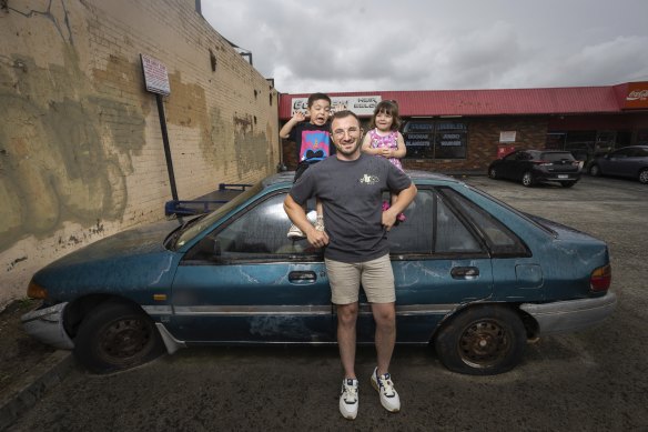 Shaun Borg with the car owned by his grandfather Frank, surrounded by his children Frank and Penelope.